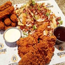 Heritage Hop Haus signature dishes H3 Burger, Street Tacos, Giant Pretzel, Loaded Mac and Cheese